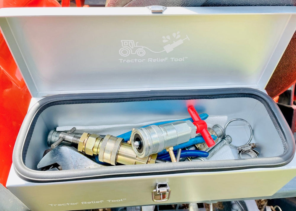 Weatherproof aluminum tractor tool box holding Tractor Relief Tools
